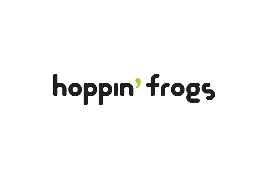 hoppin' frogs wordmark — rounded sans-serif logotype in black with a lime-green apostrophe replacing the letter i's dot; tagline 'cosy inside out'