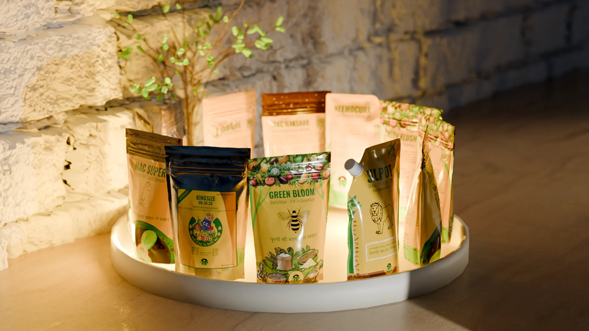 MitraSena product family on display tray — 3D rendered pouches, tubes and bottles arranged on an illuminated round tray against a brick wall background