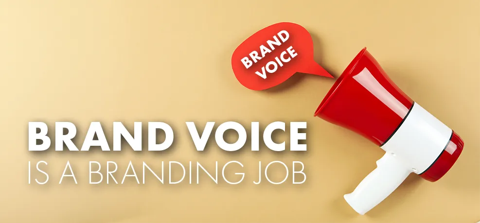 A red and white megaphone with a speech bubble reading 'brand voice', beside the words 'Brand Voice is a branding job'